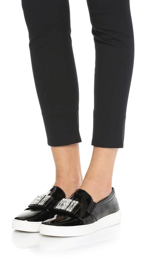 michael kors shoes slip on|Michael Kors heeled sneakers.